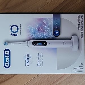 Oral-B iO Rechargeable Toothbrush Patient Starter Kit (box is open, but unused).